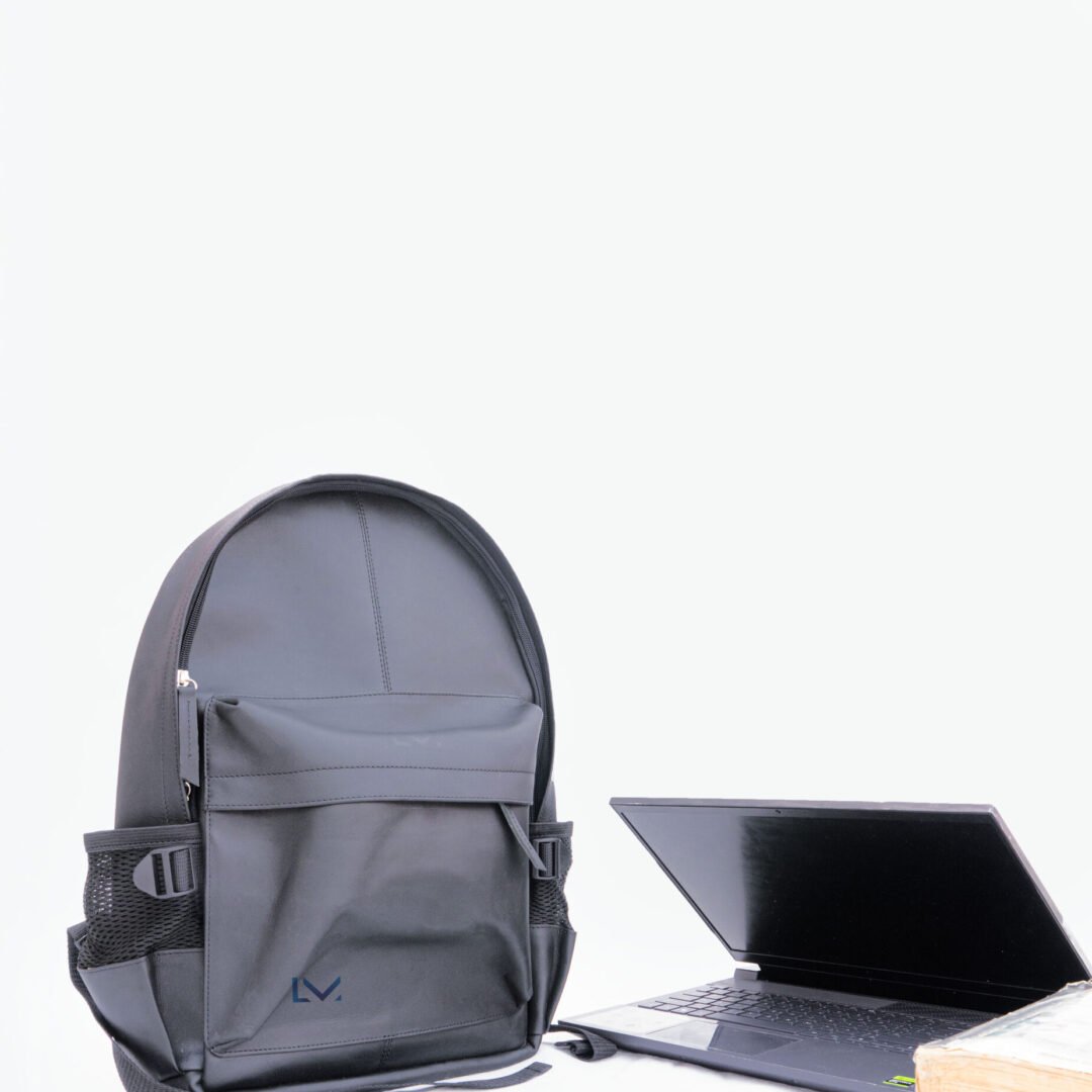 Sleek Black Leather Laptop Backpack Designed For Professionals With Multiple Compartments