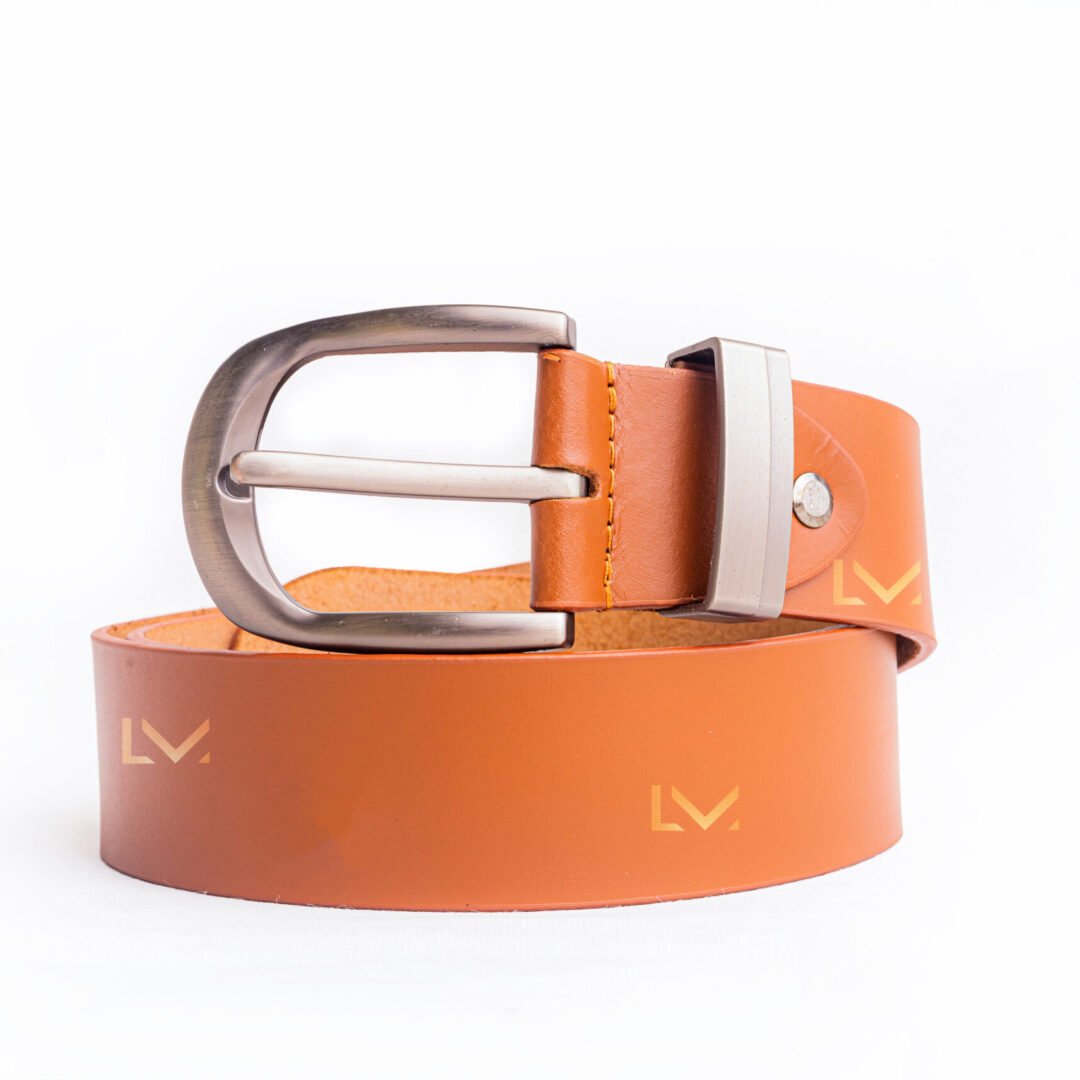 Classic Saddle Tan Leather Belt With A Smooth Finish And Elegant Design