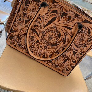 Handcrafted Tooled Leather Bag With Intricate Patterns