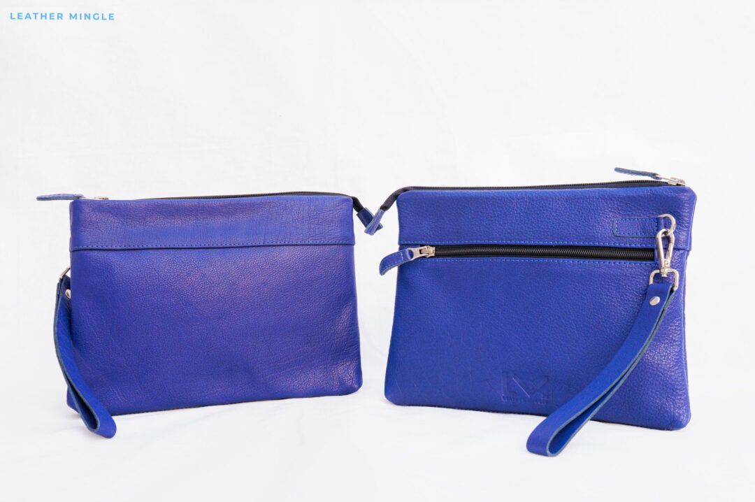 Soft Blue Leather Pouch Bag With A Minimalist Design, Perfect For Everyday Use