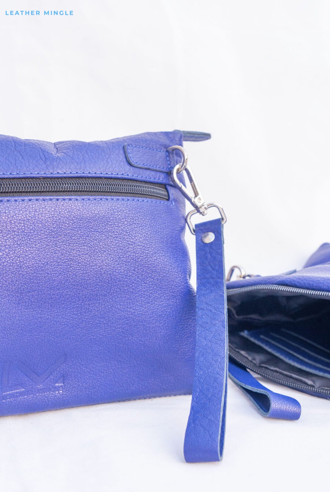 Soft Blue Leather Pouch Bag With A Minimalist Design, Perfect For Everyday Use