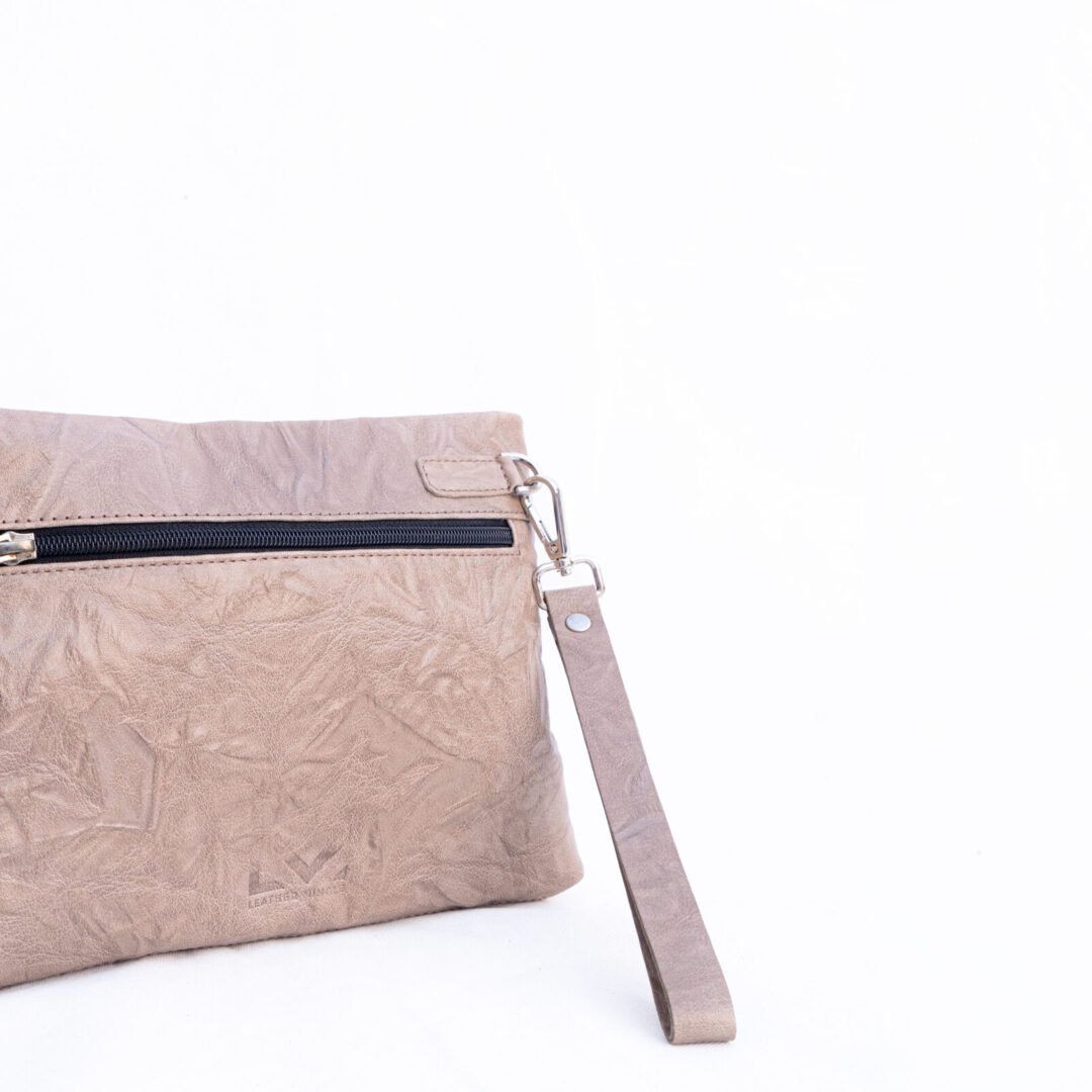 Quicksand Leather Pouch Bag With A Minimalist Design, Perfect For Everyday Use