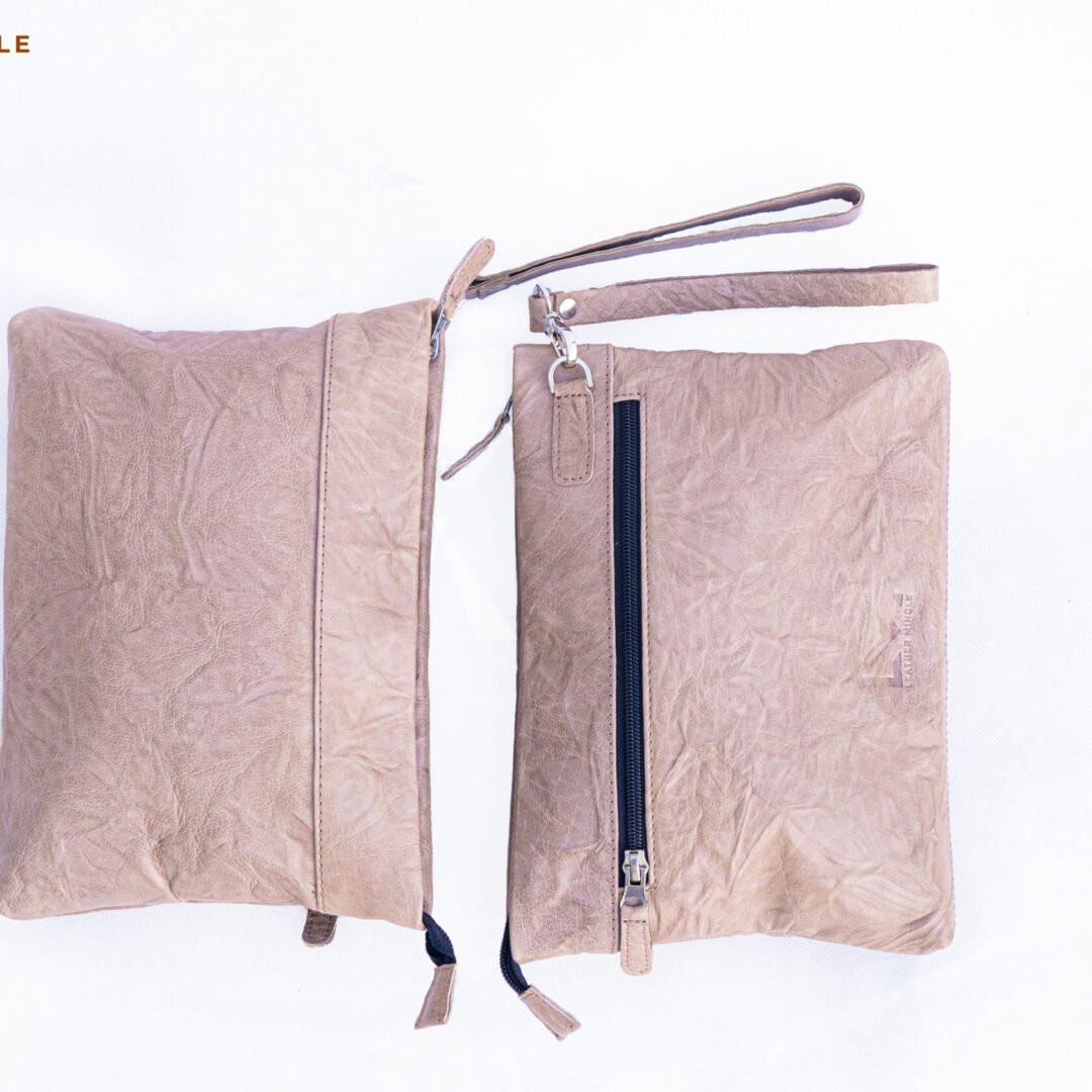 Quicksand Leather Pouch Bag With A Minimalist Design, Perfect For Everyday Use