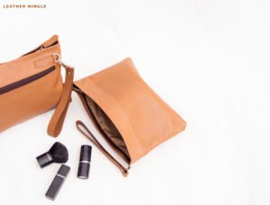 Burning sand leather pouch bag with intricate design and versatile usage