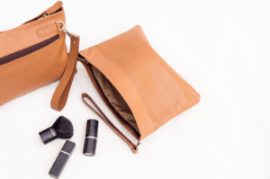Burning sand leather pouch bag with intricate design and versatile usage